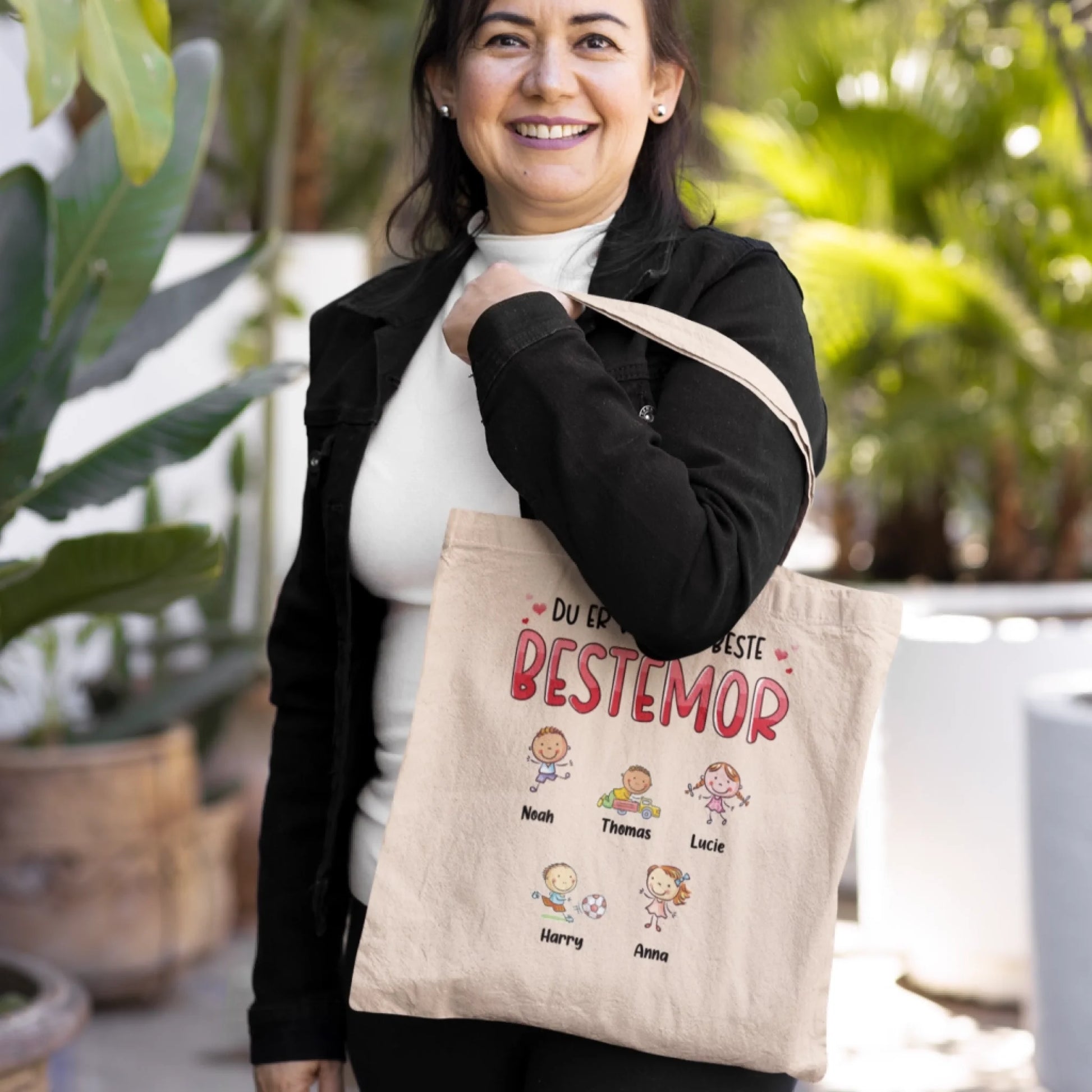 mockup-of-a-middle-aged-woman-holding-a-customizable-tote-bag-m24790